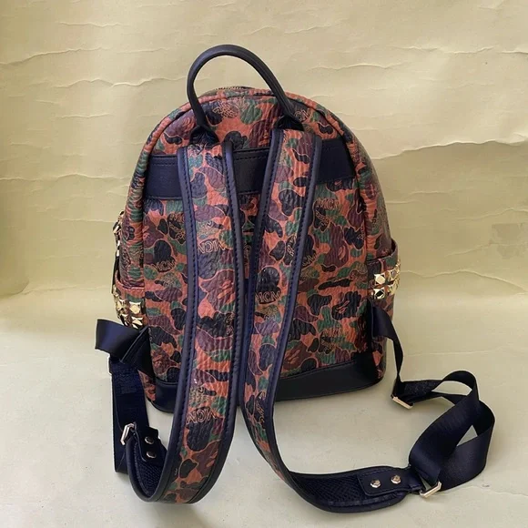 MCM x BAPE STARK large leather backpack in camo visetos limited